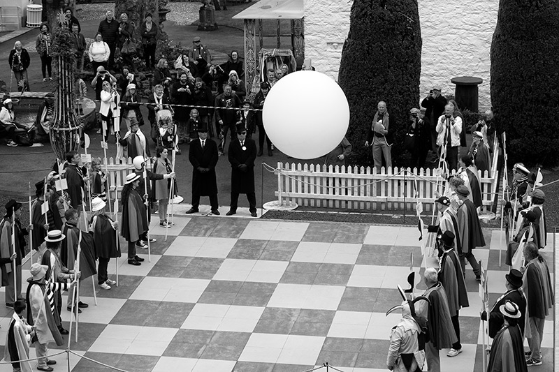 The human chess game featuring the big white ball