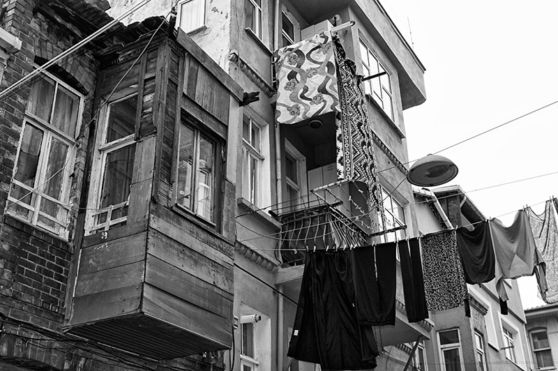 Traditional wooden Turkish houses with washing hanging outside in an Istanbul suburb