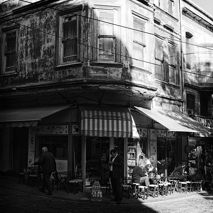 TUR0113BW9X9 A corner cafe in an old Istanbul suburb